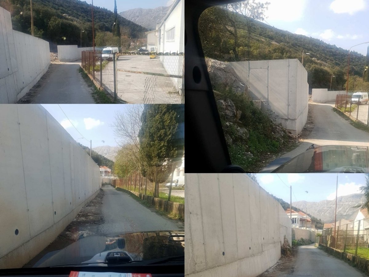 U Knežici „niknuo“ zid, inspekcijama nezanimljivo, a cestom se jedva prolazi